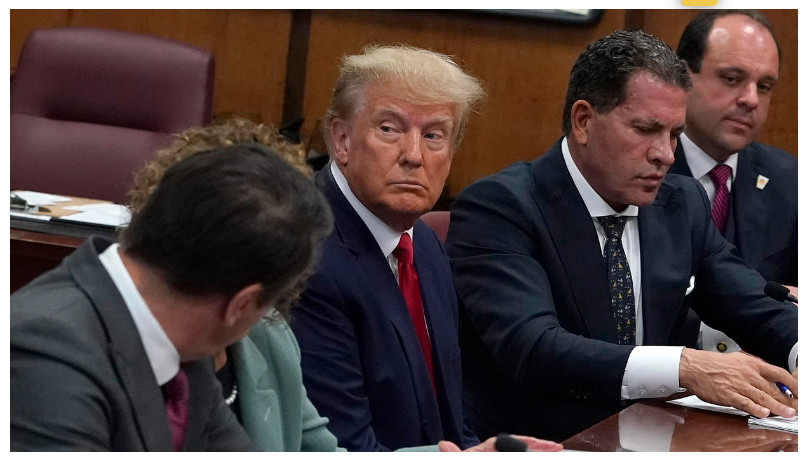 Former President Donald Trump sits with his attorneys inside the courtroom during his trial at Manhattan Criminal Court on April 4 2023 in New York City.